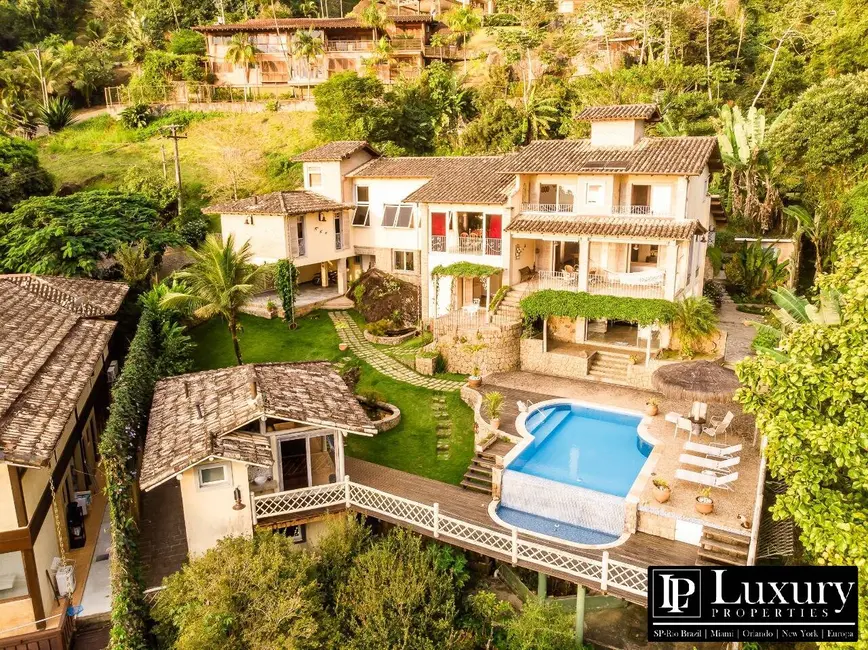 Foto 1 de Casa de Condomínio com 4 quartos à venda em Ilhabela - SP