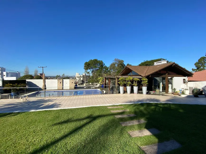 Foto 9 de Casa com 4 quartos à venda, 736m2 em Torres - RS