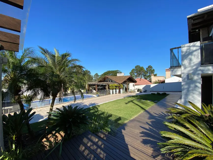 Foto 6 de Casa com 4 quartos à venda, 736m2 em Torres - RS