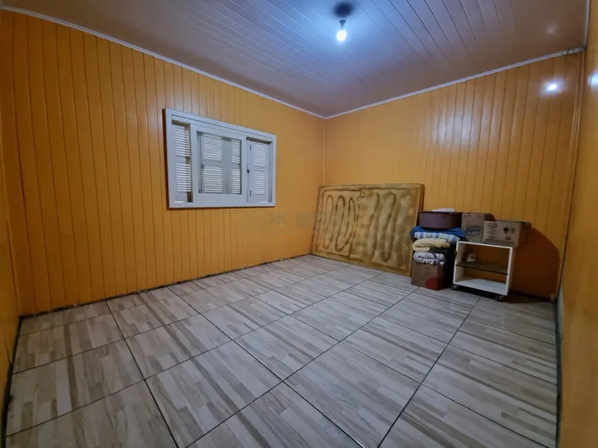Foto 2 de Casa com 2 quartos à venda, 80m2 em Torres - RS