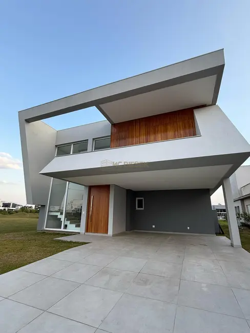 Casa de Condomínio com 4 quartos à venda, 330m2 em Torres - RS - imagem 1 Foto 1 de Casa de Condomínio com 4 quartos à venda, 330m2 em Torres - RS