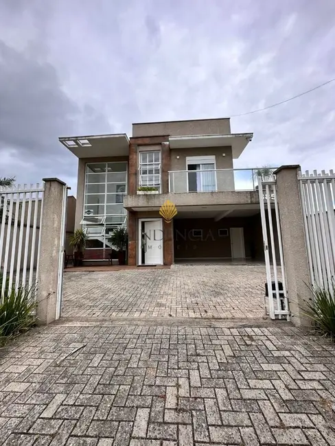 Foto 1 de Sobrado com 3 quartos à venda, 230m2 em Guaratuba - PR