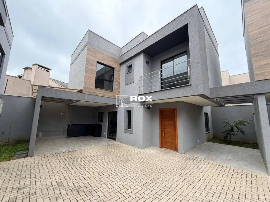 Sobrado com 3 quartos à venda, 140m2 em Butiatuvinha, Curitiba - PR - imagem 1 Foto 1 de Sobrado com 3 quartos à venda, 140m2 em Butiatuvinha, Curitiba - PR