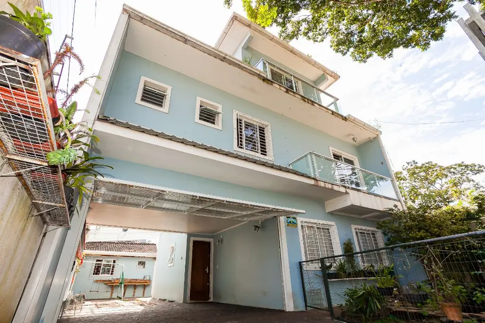 Foto 1 de Sobrado com 3 quartos à venda, 262m2 em Tarumã, Curitiba - PR