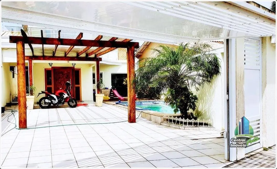 Foto 5 de Sobrado com 4 quartos à venda, 150m2 em Solemar, Praia Grande - SP