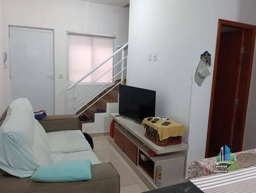 Foto 2 de Casa de Condomínio com 2 quartos à venda, 54m2 em Tupi, Praia Grande - SP