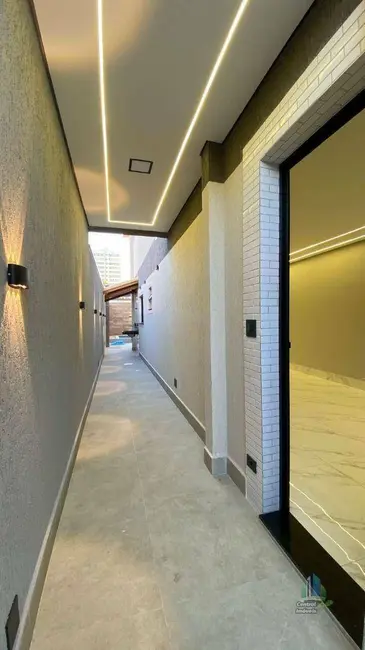 Foto 4 de Sobrado com 3 quartos à venda, 150m2 em Maracanã, Praia Grande - SP