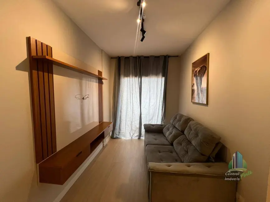 Foto 3 de Apartamento com 1 quarto à venda, 36m2 em Maracanã, Praia Grande - SP