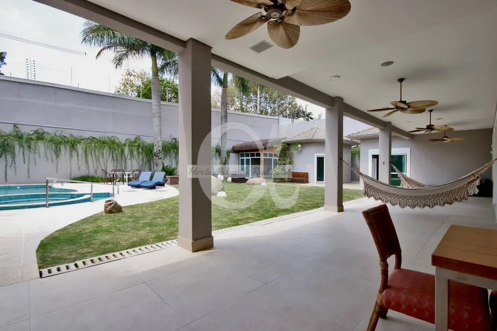 Foto 5 de Casa com 5 quartos à venda, 709m2 em Alphaville Residencial Um, Barueri - SP