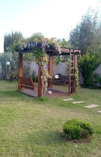 Casa com 3 quartos à venda, 243m2 em Centro, Torres - RS - imagem 4 Foto 4 de Casa com 3 quartos à venda, 243m2 em Centro, Torres - RS