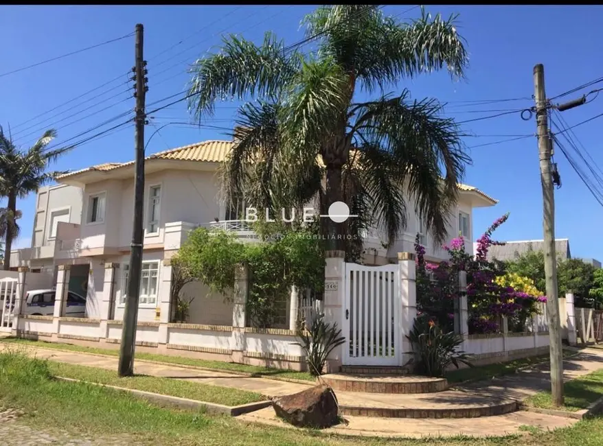 Foto 1 de Casa com 4 quartos à venda, 318m2 em Torres - RS