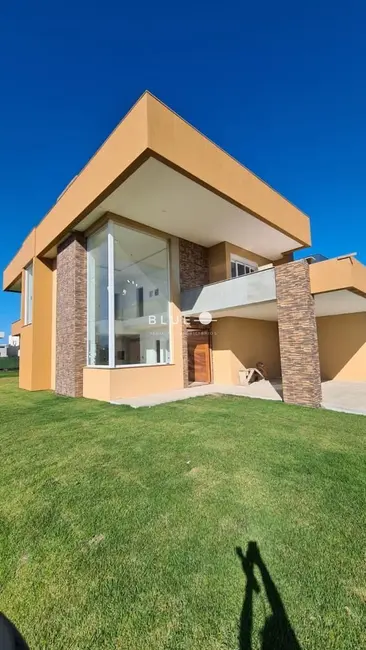 Foto 2 de Casa de Condomínio com 4 quartos à venda, 245m2 em Torres - RS