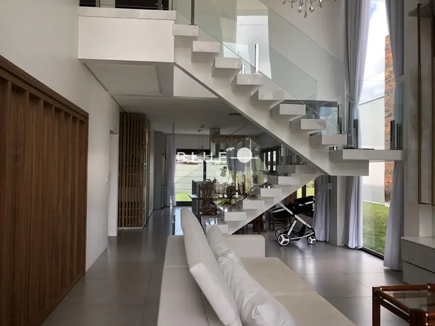 Casa de Condomínio com 4 quartos à venda, 300m2 em Torres - RS - imagem 4 Foto 4 de Casa de Condomínio com 4 quartos à venda, 300m2 em Torres - RS