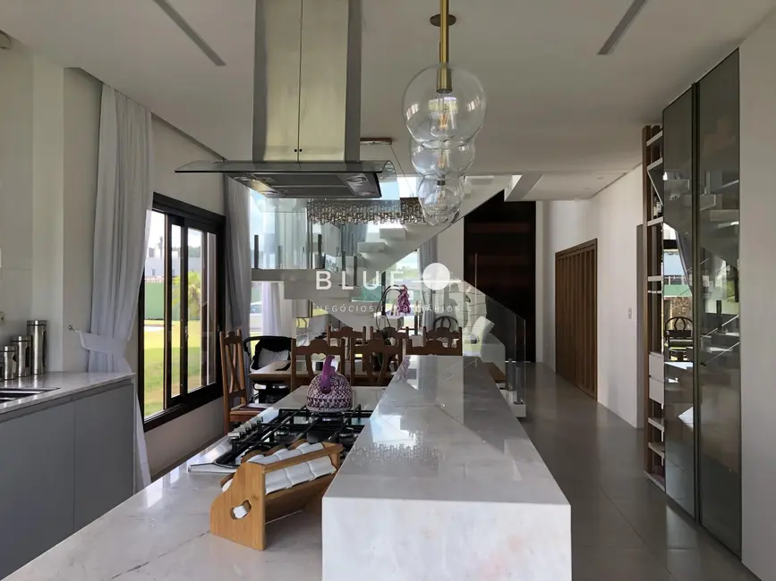 Casa de Condomínio com 4 quartos à venda, 300m2 em Torres - RS - imagem 7 Foto 7 de Casa de Condomínio com 4 quartos à venda, 300m2 em Torres - RS