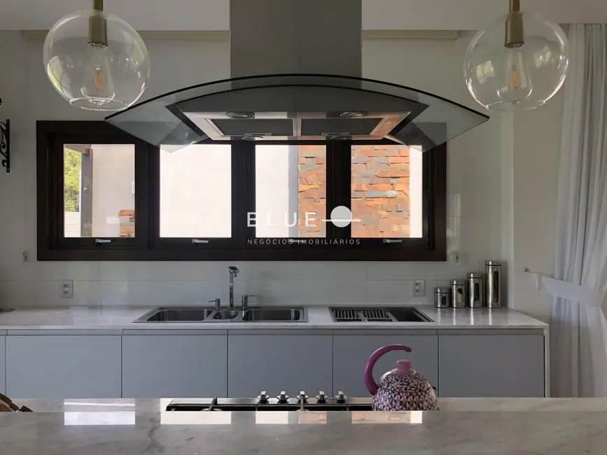 Casa de Condomínio com 4 quartos à venda, 300m2 em Torres - RS - imagem 6 Foto 6 de Casa de Condomínio com 4 quartos à venda, 300m2 em Torres - RS