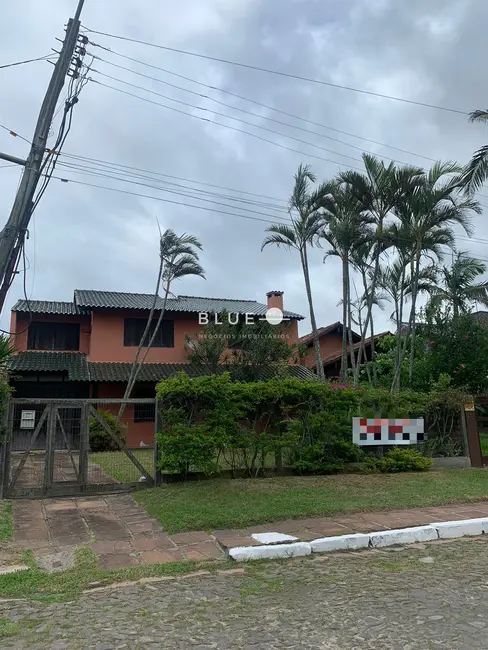 Casa com 3 quartos à venda, 220m2 em Torres - RS - imagem 1 Foto 1 de Casa com 3 quartos à venda, 220m2 em Torres - RS