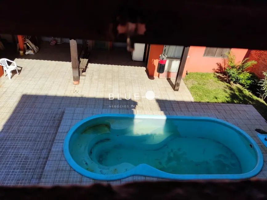 Casa com 3 quartos à venda, 220m2 em Torres - RS - imagem 9 Foto 9 de Casa com 3 quartos à venda, 220m2 em Torres - RS