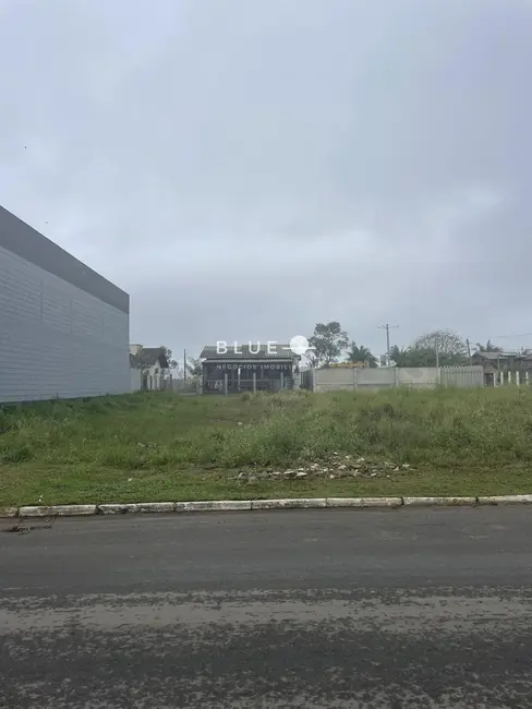 Foto 1 de Terreno / Lote à venda, 390m2 em Torres - RS