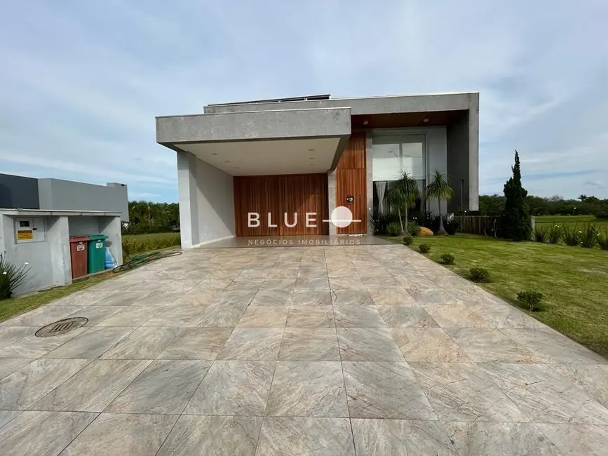 Casa de Condomínio com 4 quartos à venda, 278m2 em Torres - RS - imagem 1 Foto 1 de Casa de Condomínio com 4 quartos à venda, 278m2 em Torres - RS