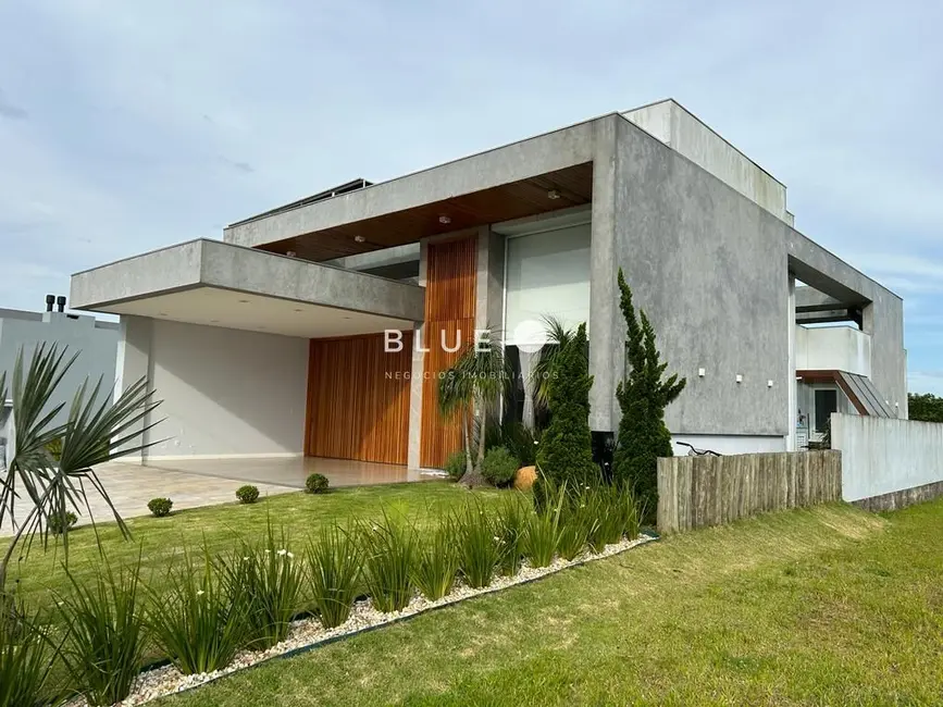 Casa de Condomínio com 4 quartos à venda, 278m2 em Torres - RS - imagem 2 Foto 2 de Casa de Condomínio com 4 quartos à venda, 278m2 em Torres - RS