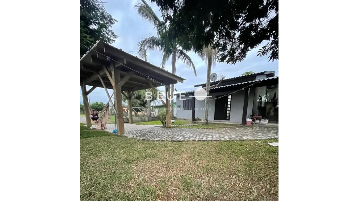 Foto 1 de Casa com 2 quartos à venda, 100m2 em Torres - RS
