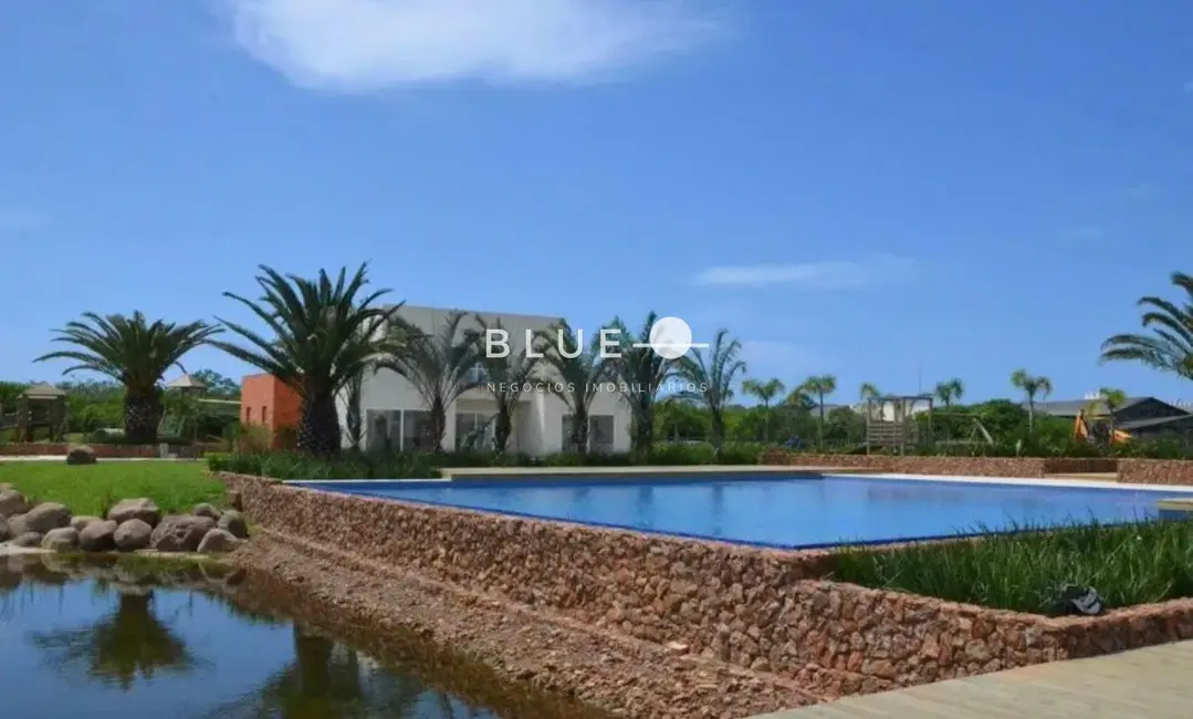Foto 1 de Terreno / Lote à venda, 420m2 em Torres - RS