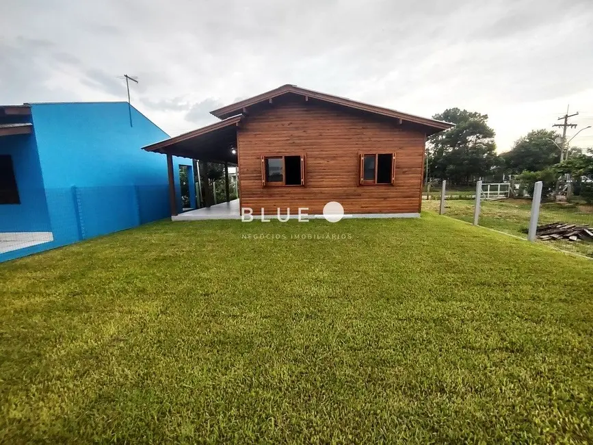 Casa com 2 quartos à venda, 112m2 em Torres - RS - imagem 3 Foto 3 de Casa com 2 quartos à venda, 112m2 em Torres - RS