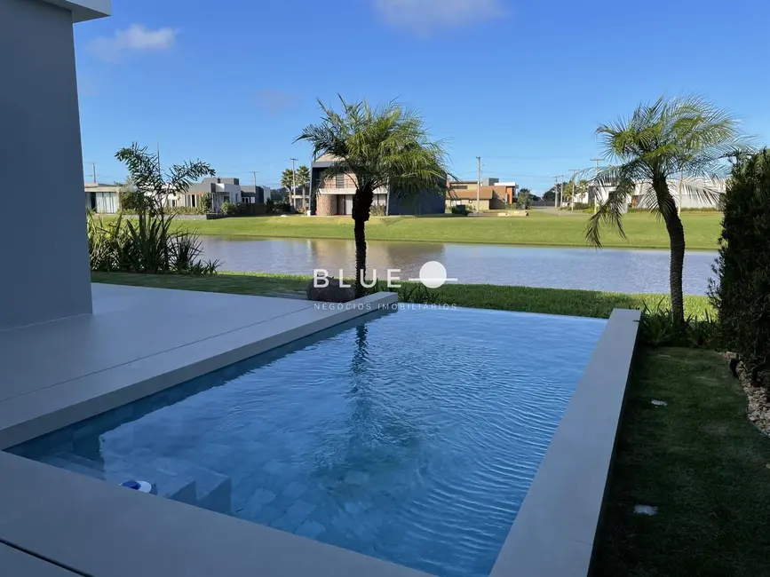 Foto 9 de Casa de Condomínio com 4 quartos à venda, 265m2 em Torres - RS