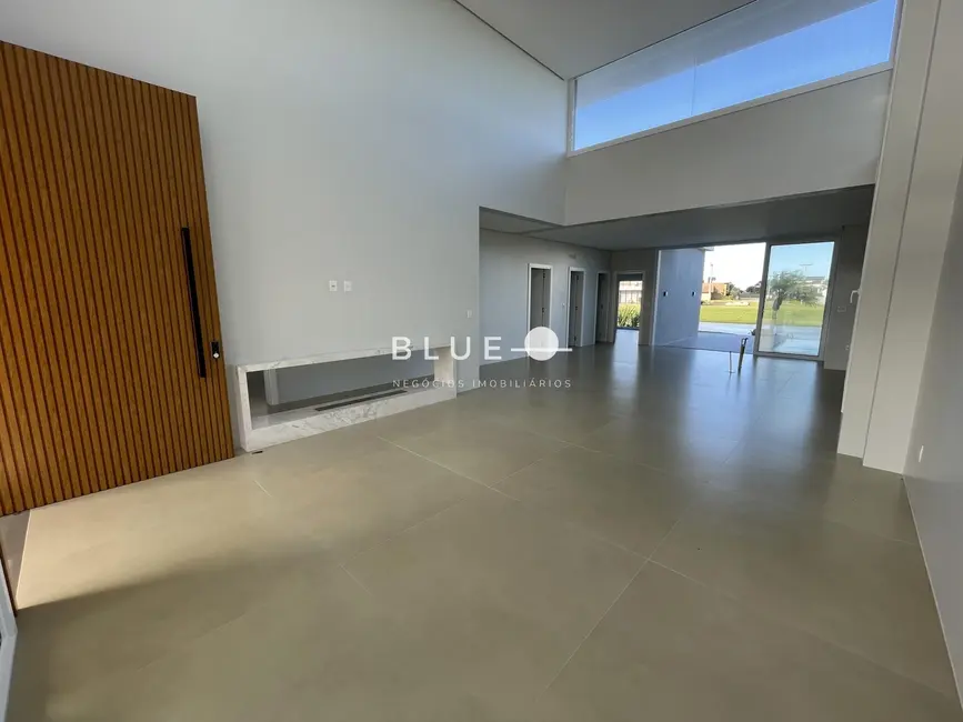 Foto 4 de Casa de Condomínio com 4 quartos à venda, 265m2 em Torres - RS