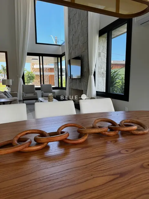 Foto 1 de Casa de Condomínio com 4 quartos à venda, 245m2 em Torres - RS