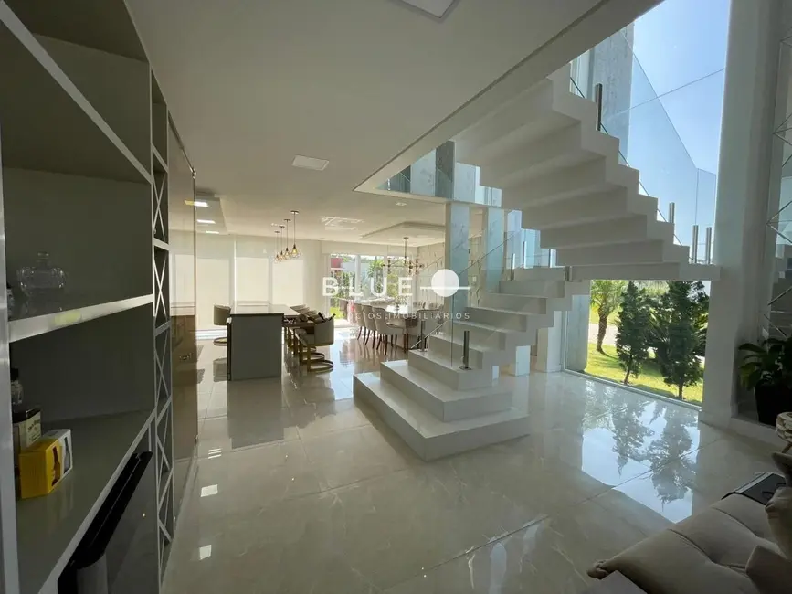 Casa de Condomínio com 4 quartos à venda, 377m2 em Torres - RS - imagem 5 Foto 5 de Casa de Condomínio com 4 quartos à venda, 377m2 em Torres - RS