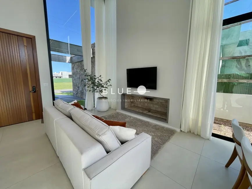 Casa de Condomínio com 3 quartos à venda, 205m2 em Torres - RS - imagem 6 Foto 6 de Casa de Condomínio com 3 quartos à venda, 205m2 em Torres - RS