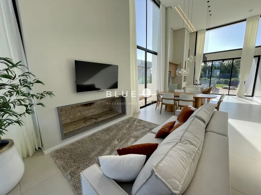 Casa de Condomínio com 3 quartos à venda, 205m2 em Torres - RS - imagem 4 Foto 4 de Casa de Condomínio com 3 quartos à venda, 205m2 em Torres - RS