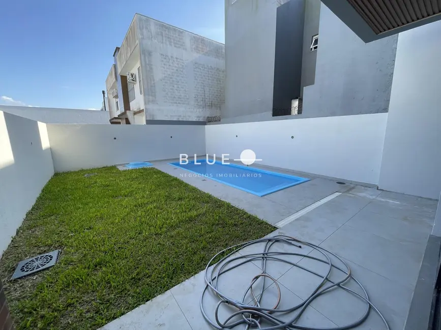 Casa com 3 quartos à venda, 142m2 em Torres - RS - imagem 9 Foto 9 de Casa com 3 quartos à venda, 142m2 em Torres - RS