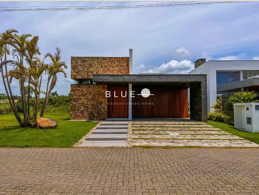 Foto 1 de Casa de Condomínio com 3 quartos à venda, 225m2 em Torres - RS