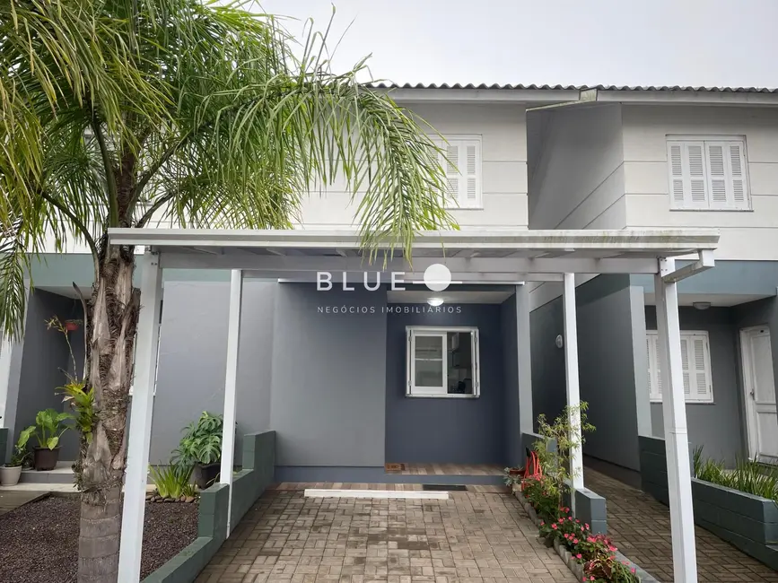Sobrado com 2 quartos à venda, 53m2 em Torres - RS - imagem 1 Foto 1 de Sobrado com 2 quartos à venda, 53m2 em Torres - RS