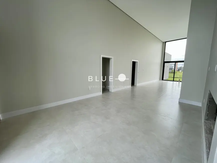 Casa de Condomínio com 4 quartos à venda, 201m2 em Torres - RS - imagem 5 Foto 5 de Casa de Condomínio com 4 quartos à venda, 201m2 em Torres - RS