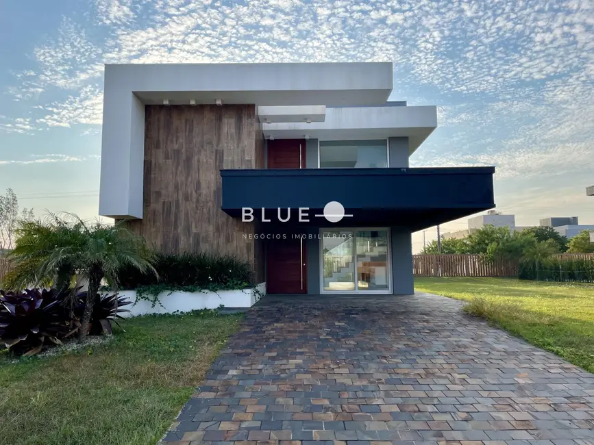 Foto 1 de Casa de Condomínio com 5 quartos à venda, 295m2 em Torres - RS