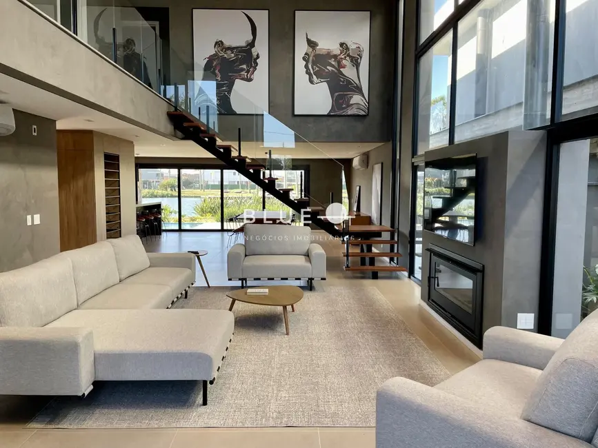 Foto 1 de Casa de Condomínio com 5 quartos à venda, 394m2 em Torres - RS
