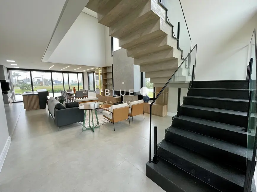 Foto 2 de Casa de Condomínio com 4 quartos à venda, 339m2 em Torres - RS
