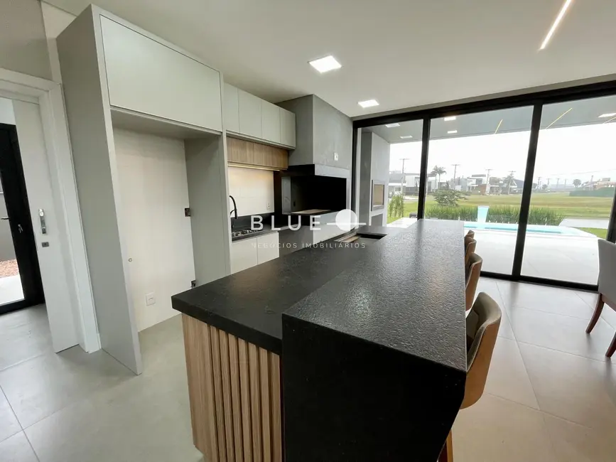 Casa de Condomínio com 4 quartos à venda, 339m2 em Torres - RS - imagem 9 Foto 9 de Casa de Condomínio com 4 quartos à venda, 339m2 em Torres - RS