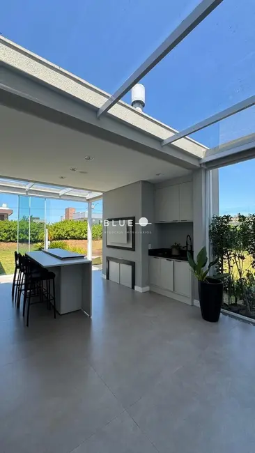 Casa de Condomínio com 3 quartos à venda, 227m2 em Torres - RS - imagem 9 Foto 9 de Casa de Condomínio com 3 quartos à venda, 227m2 em Torres - RS