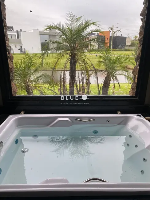 Casa de Condomínio com 4 quartos à venda, 250m2 em Torres - RS - imagem 6 Foto 6 de Casa de Condomínio com 4 quartos à venda, 250m2 em Torres - RS