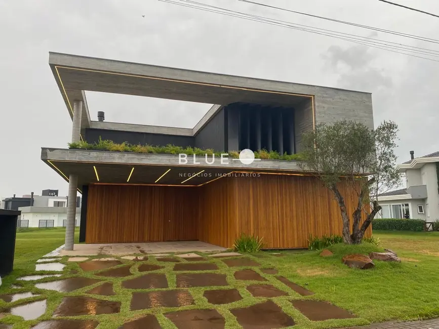 Casa de Condomínio com 4 quartos à venda, 250m2 em Torres - RS - imagem 2 Foto 2 de Casa de Condomínio com 4 quartos à venda, 250m2 em Torres - RS