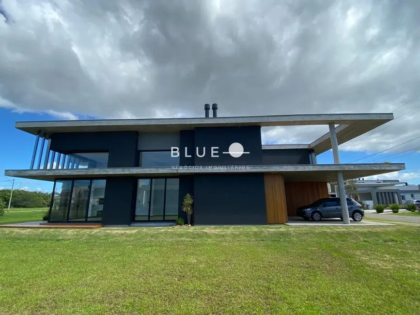 Casa de Condomínio com 4 quartos à venda, 250m2 em Torres - RS - imagem 5 Foto 5 de Casa de Condomínio com 4 quartos à venda, 250m2 em Torres - RS