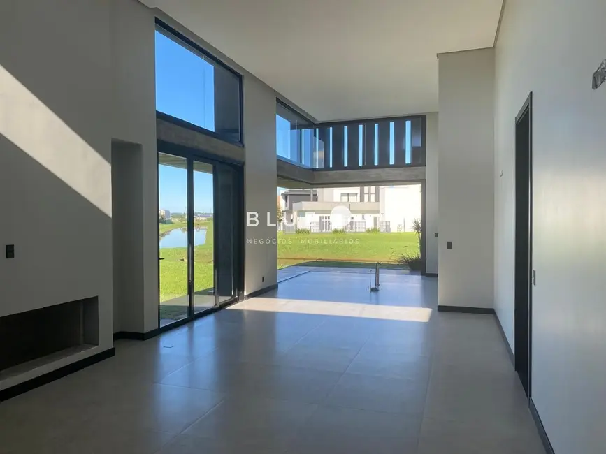 Casa de Condomínio com 4 quartos à venda, 250m2 em Torres - RS - imagem 3 Foto 3 de Casa de Condomínio com 4 quartos à venda, 250m2 em Torres - RS