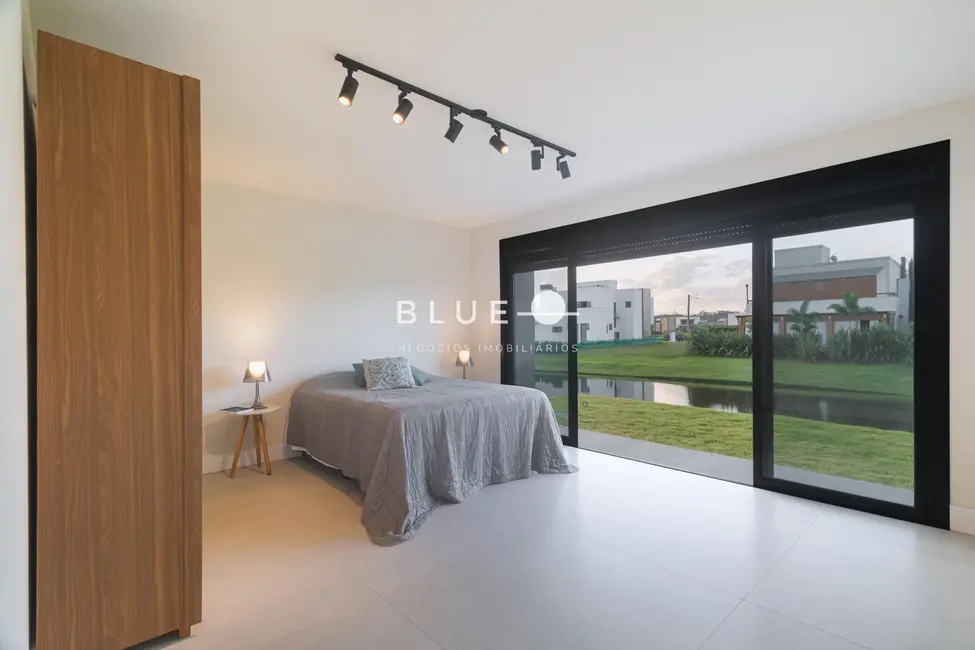 Casa de Condomínio com 3 quartos à venda, 162m2 em Torres - RS - imagem 9 Foto 9 de Casa de Condomínio com 3 quartos à venda, 162m2 em Torres - RS