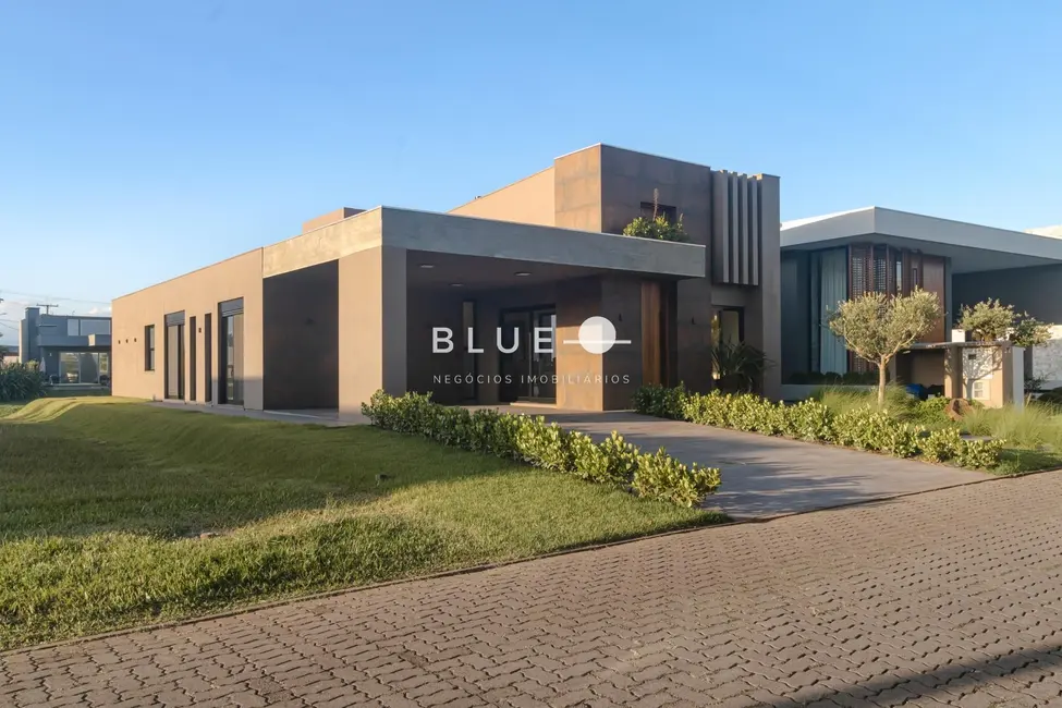 Casa de Condomínio com 3 quartos à venda, 162m2 em Torres - RS - imagem 1 Foto 1 de Casa de Condomínio com 3 quartos à venda, 162m2 em Torres - RS