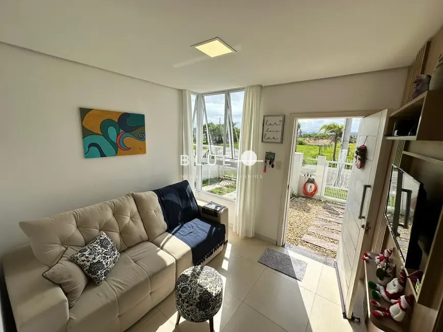 Foto 1 de Sobrado com 3 quartos à venda, 110m2 em Torres - RS