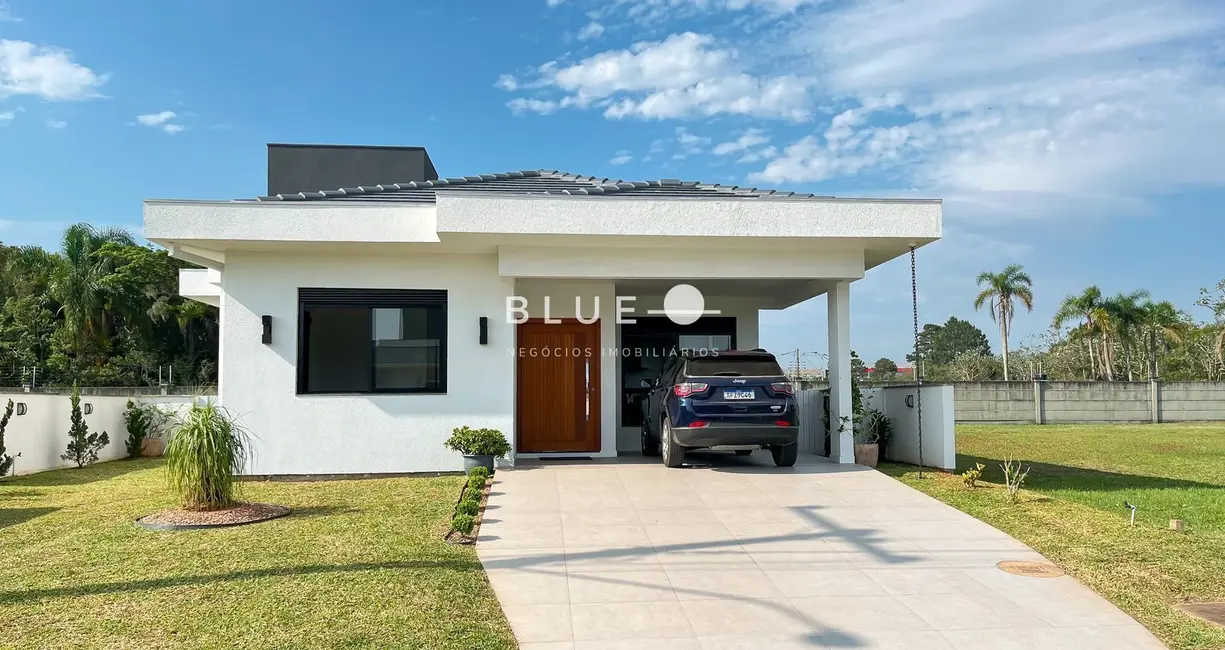 Foto 1 de Casa de Condomínio com 3 quartos à venda, 165m2 em Torres - RS